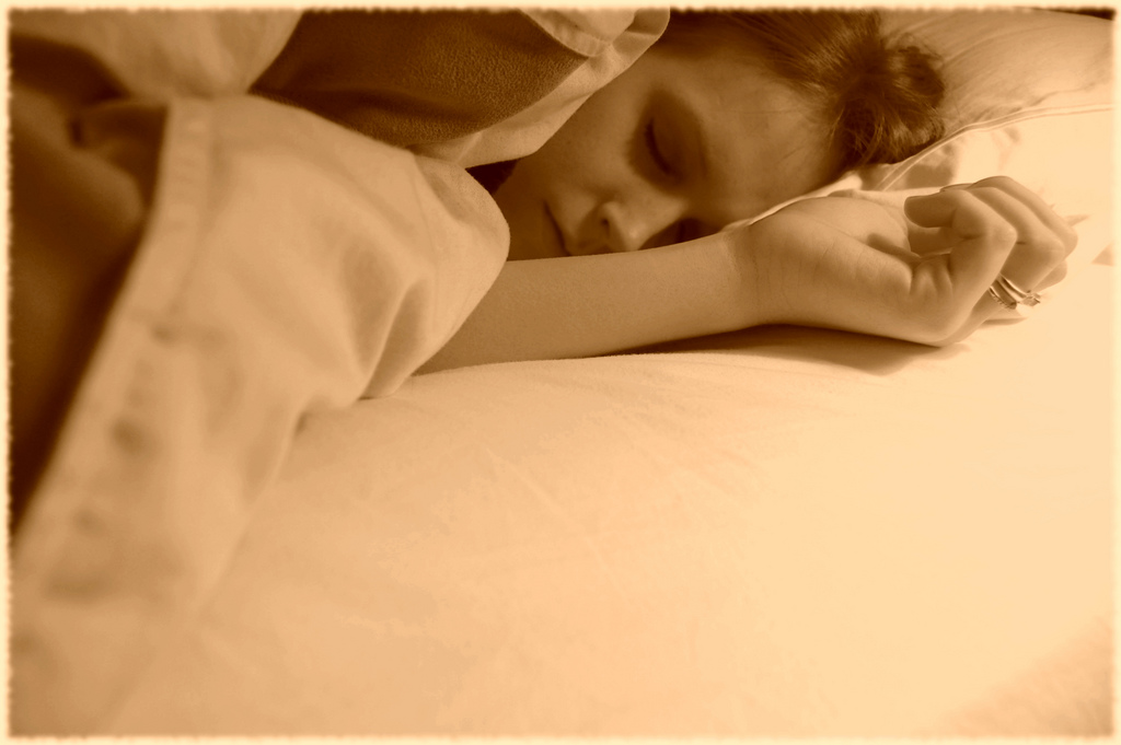 sleeping on bed